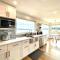 Modern Beachfront Cabin with Hot Tub and Spectacular Views - Allyn