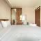 Modern & Cozy 2BR at Gateway Pasteur Apartment By Travelio