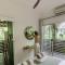 Reinwood Retreat - A home Nestled in the Treetops of a Rainforest