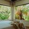 Reinwood Retreat - A home Nestled in the Treetops of a Rainforest
