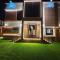 Anushthan Villa a private serviced villa for events and staycation with luxury views of garden and fountain pool in UAE - Adžmán