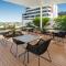 Bright Apt with Balcony, Rooftop Pool & Parking!