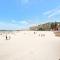 Ultima Escapes - Glenelg Beachfront Bliss - Direct Beach Access, Pool, Gym, Free Parking, Wi-Fi