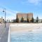 Ultima Escapes - Glenelg Beachfront Bliss - Direct Beach Access, Pool, Gym, Free Parking, Wi-Fi