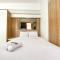Modern Look and Warm Studio at Vasanta Innopark Apartment By Travelio - 贝克西
