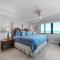 Oceanfront corner views with wrap around balcony and complex pool - New Smyrna Beach