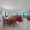 Oceanfront corner views with wrap around balcony and complex pool - New Smyrna Beach