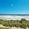 Large balcony with direct oceanfront views and access to complex pool - New Smyrna Beach