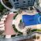 Spacious 1BR - Balcony & Pool View - Capital Bay - Dubaj