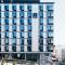 Glo Hotel Sello