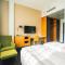 Glo Hotel Sello