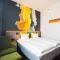 Glo Hotel Sello