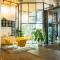 Glo Hotel Sello