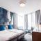 Glo Hotel Sello