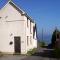 The Snug a cosy, quirky detached cottage with sea views