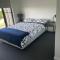 New Spacious 4 Bedroom Retreat fully air conditioned in Loganholme