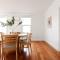 Charming 3-Bedroom Home with Sunroom & Parking
