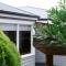 Charming 3-Bedroom Home with Sunroom & Parking