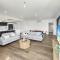 Modern 3-Bedroom Golfside Apartment with Balcony