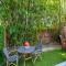 Designer Sun Filled Condo - Walk to Town