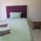 Quarto privado em casa com piscina compartilhada e a 6 minutos do centro da cidade - Сьюдад-дель-Есте