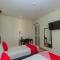 Super OYO 596 The Vintage Hotel
