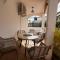 Studio cosy avec piscine dans une villa