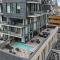 Stylish Condo with Exclusive Rooftop Pool