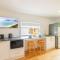 East Belmont, 38 Tomaree Rd - spa, linen, Wi-Fi, Air Con , Games Room