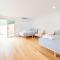 East Belmont, 38 Tomaree Rd - spa, linen, Wi-Fi, Air Con , Games Room