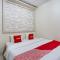 OYO Life 90606 Glass House Citraland Syariah