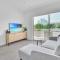 Modern 1BR Condo, 2 min walk to prime Seven Mile Beach, The Grove Unit 33