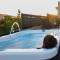 Thearia villa I - seaview , private heated pool & jacuzzi