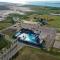 Stylish 2BR Coastal Getaway w Pool Prime Location Lazy Fun - Port Aransas