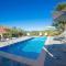 In Bocca Al Lupo with Shared Pool - Happy Rentals