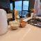 1BR Sunset Glow Central Retreat! Free Tram Zone