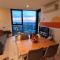 1BR Sunset Glow Central Retreat! Free Tram Zone