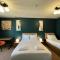 Nomi Rooms & Restaurant