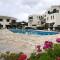 Luxurious 3-Bed Villa, Modern Decor, Communal Pool