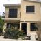 Luxurious 3-Bed Villa, Modern Decor, Communal Pool
