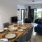 Luxurious 3-Bed Villa, Modern Decor, Communal Pool