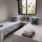 Luxurious 3-Bed Villa, Modern Decor, Communal Pool