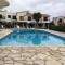 Luxurious 3-Bed Villa, Modern Decor, Communal Pool