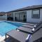 Luxury 4BR Entertainment house with Heated Pool - كيب كورال
