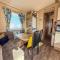 Lovely 6 Berth Caravan With Decking To The Side In Heacham Ref 21040E