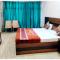 A PREMIUM Hotel Nirmala Palace Ayodhya Near Shri Ram Janmabhoomi and Hanuman Garhi - Railway Station - Restaurant & Parking Facilities - Prime Location With Luxury and Spacious Room - Book Now - Ayodhya