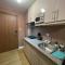 SPRING RESIDENCES - 2BR Condo near Airport with balcony and pool views - 马尼拉