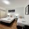 city staycation studio with 2 beds