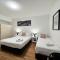 city staycation studio with 2 beds
