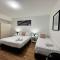 city staycation studio with 2 beds